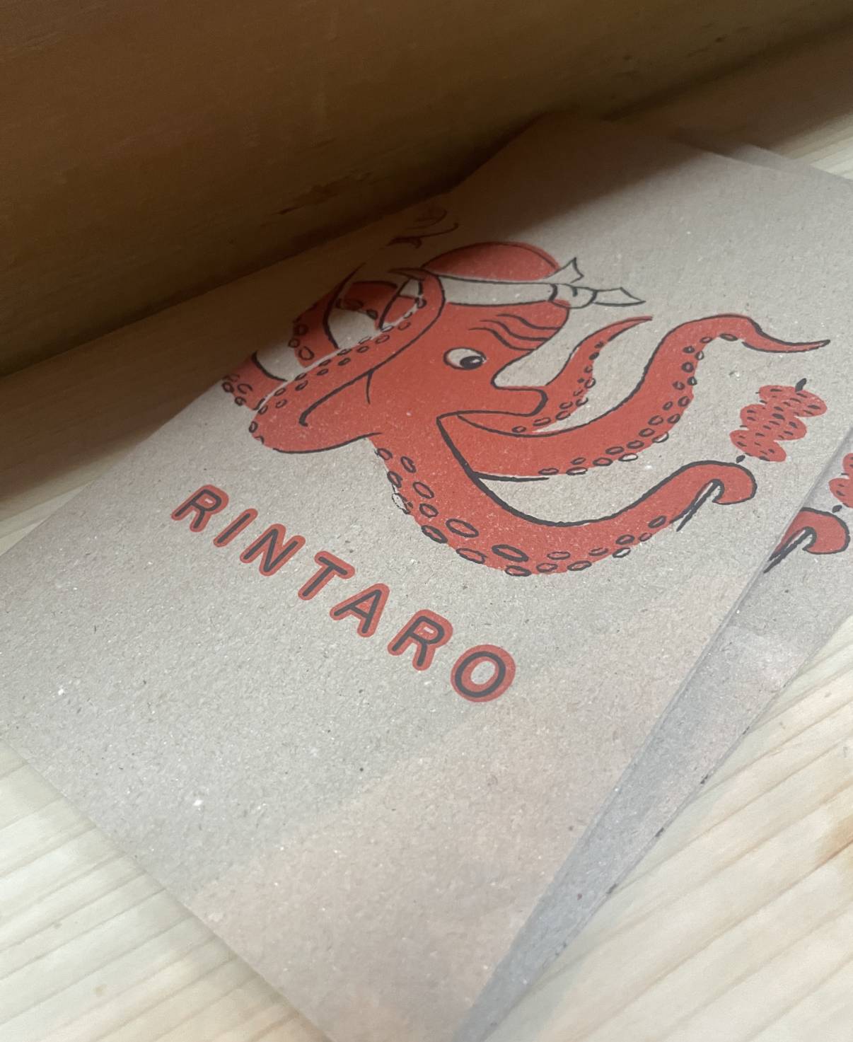 Octopus logo paper at Rintaro