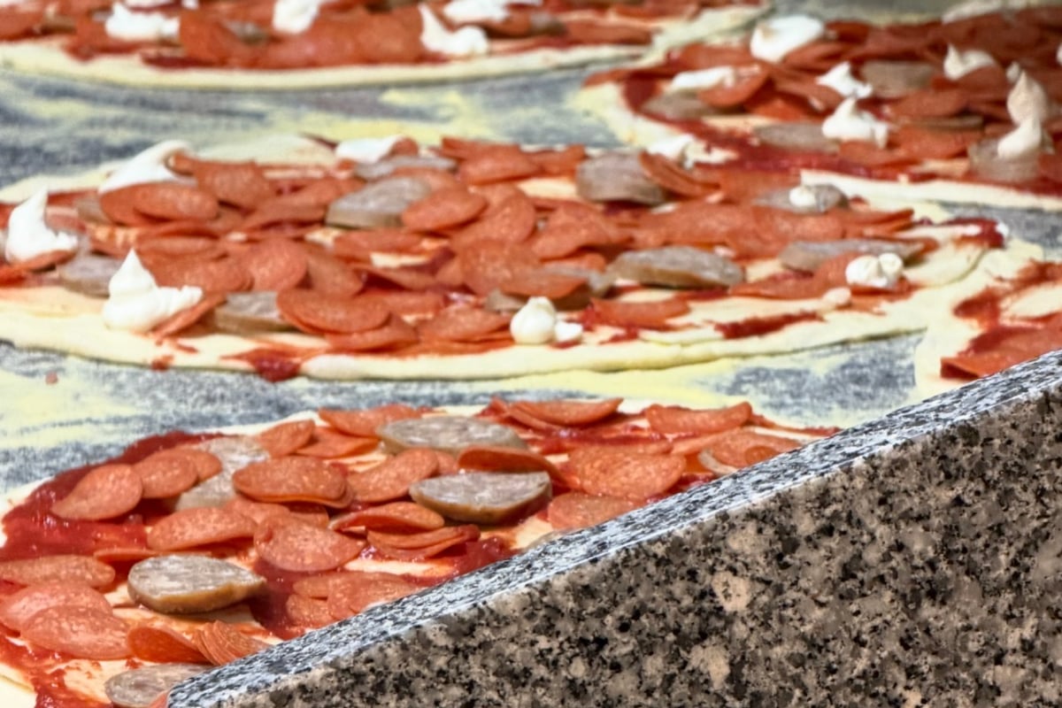 Pizzas on the line at Tony's Pizza Napoletana